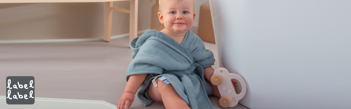 Banner Verzorging Baby Textiel Baby badjas Label Label blauw
